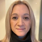 Portrait of Natalie McWaters of AIM Insurance